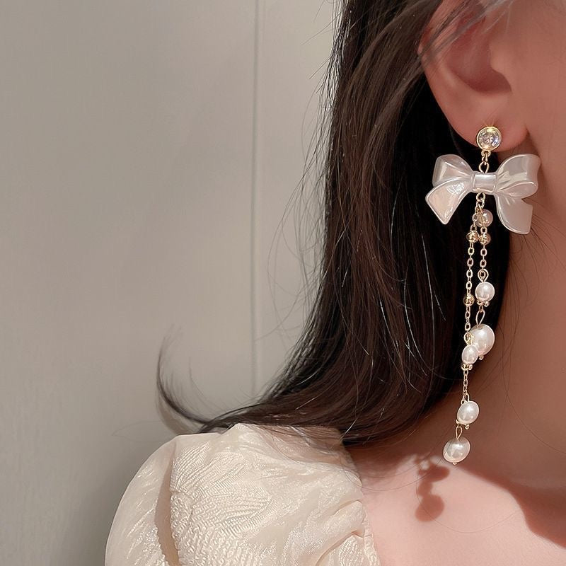 Boucles d'oreilles pendantes en forme de nœud papillon avec strass