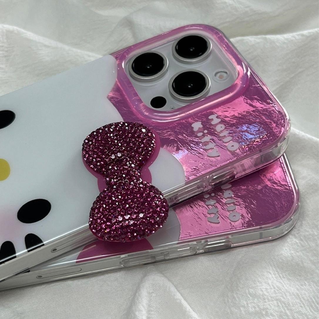 Schicke rosa Handyhülle mit Strass-Schleife und Kätzchenmotiv