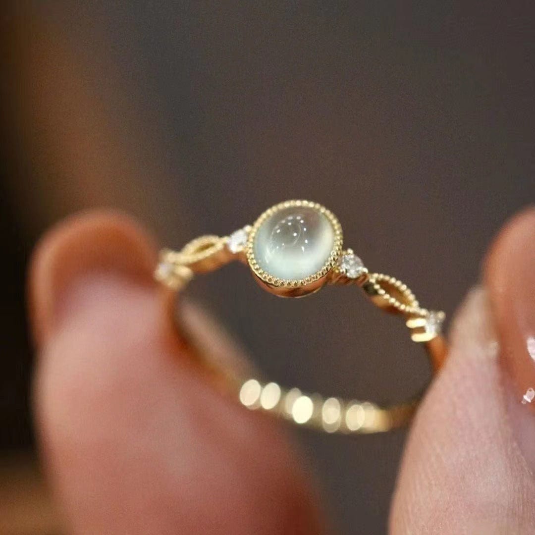 Charmante bague en opale de style baroque