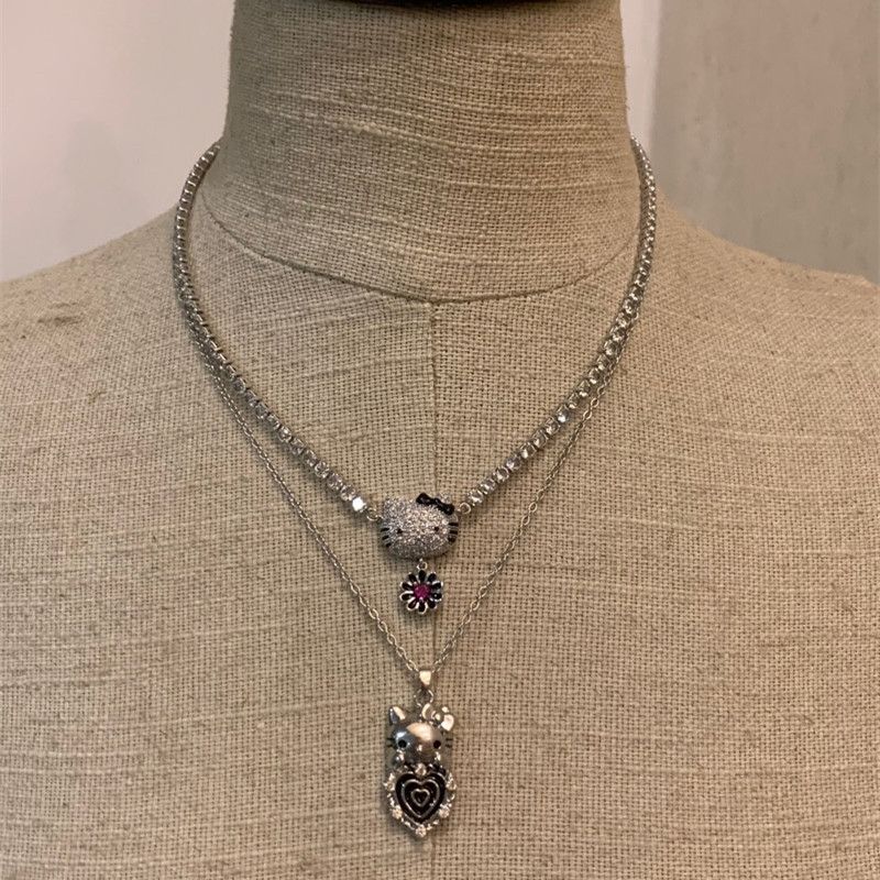 Collier de fleurs en forme de chat avec un joli diamant KI681