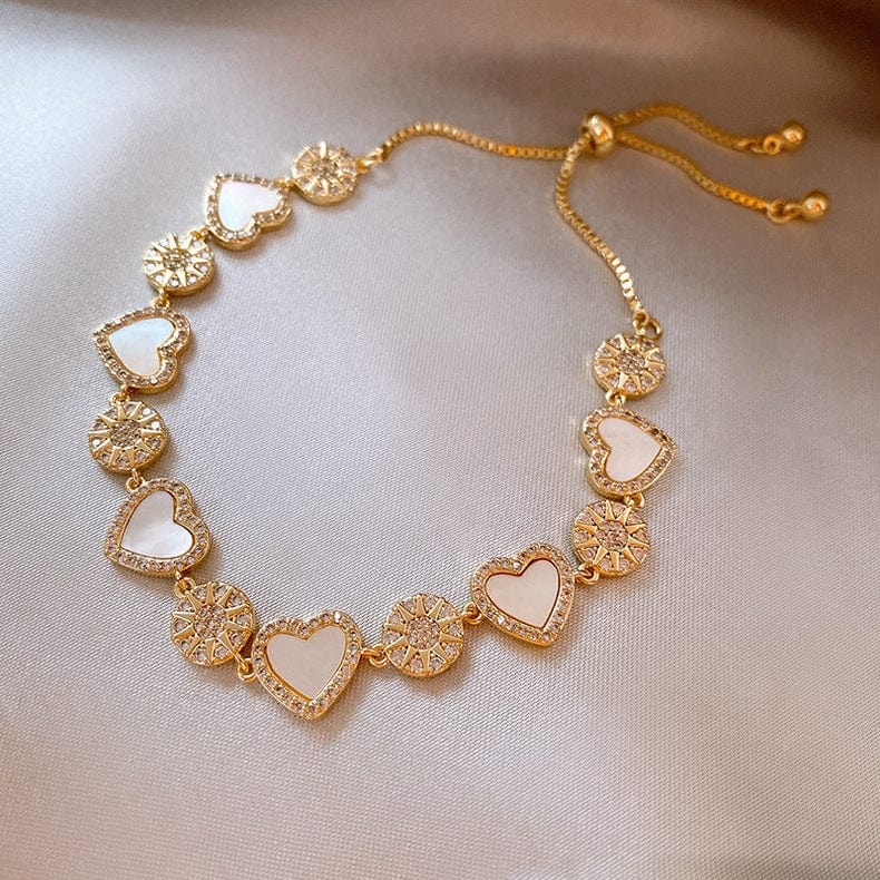 Bracelet coeur en nacre naturelle et or