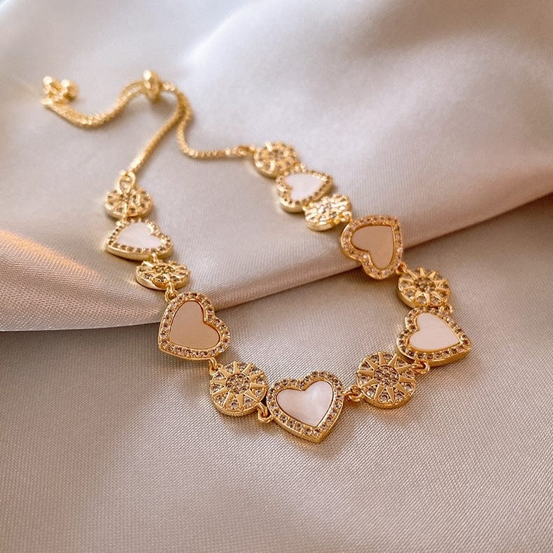 Bracelet coeur en nacre naturelle et or