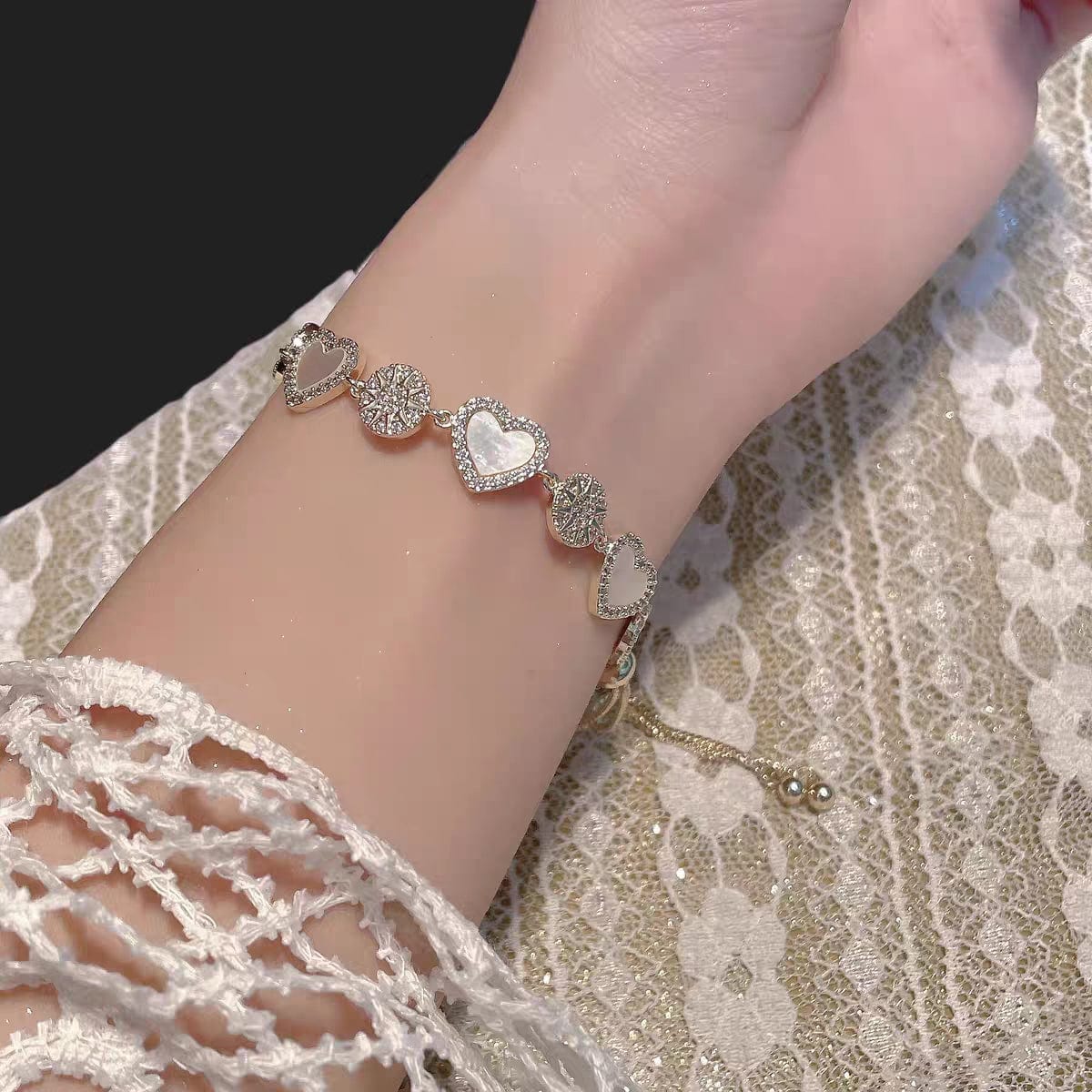 Bracelet coeur en nacre naturelle et or