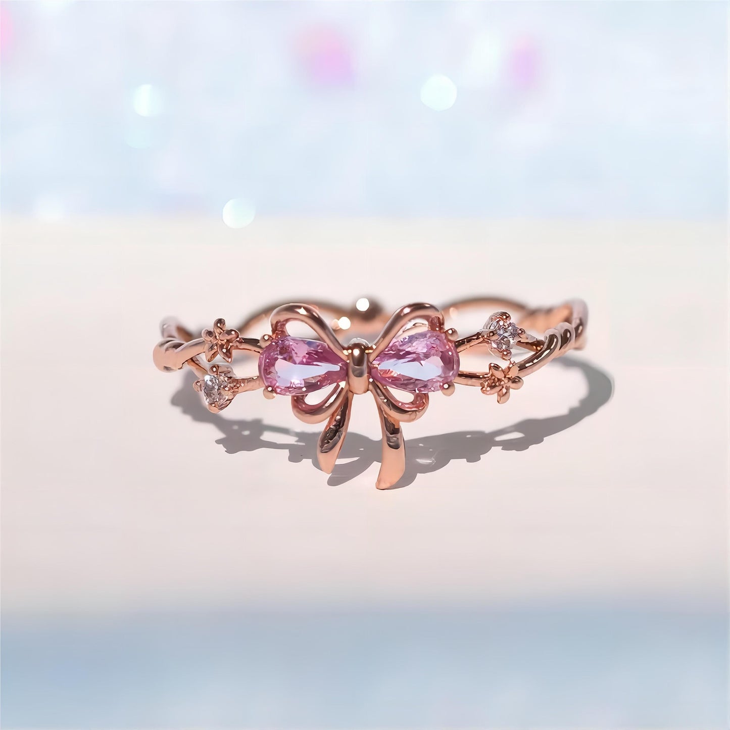 Bague ajustable en cristal avec nœud papillon floral