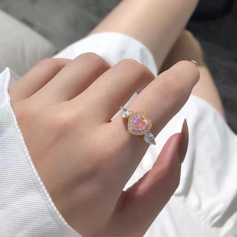 Bague en forme de cœur avec ailes d'ange en cristal rose ajustable