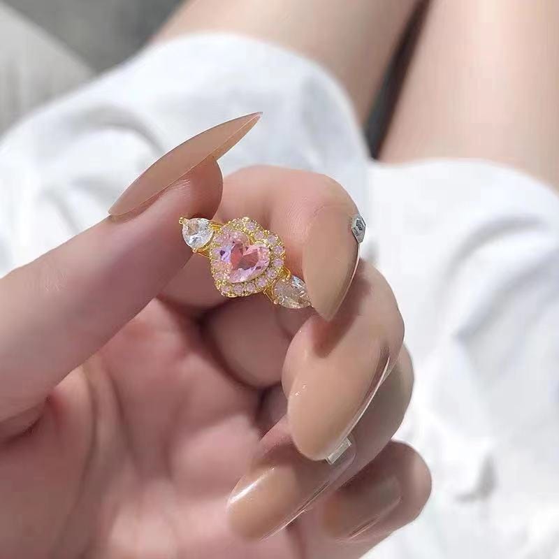 Bague en forme de cœur avec ailes d'ange en cristal rose ajustable