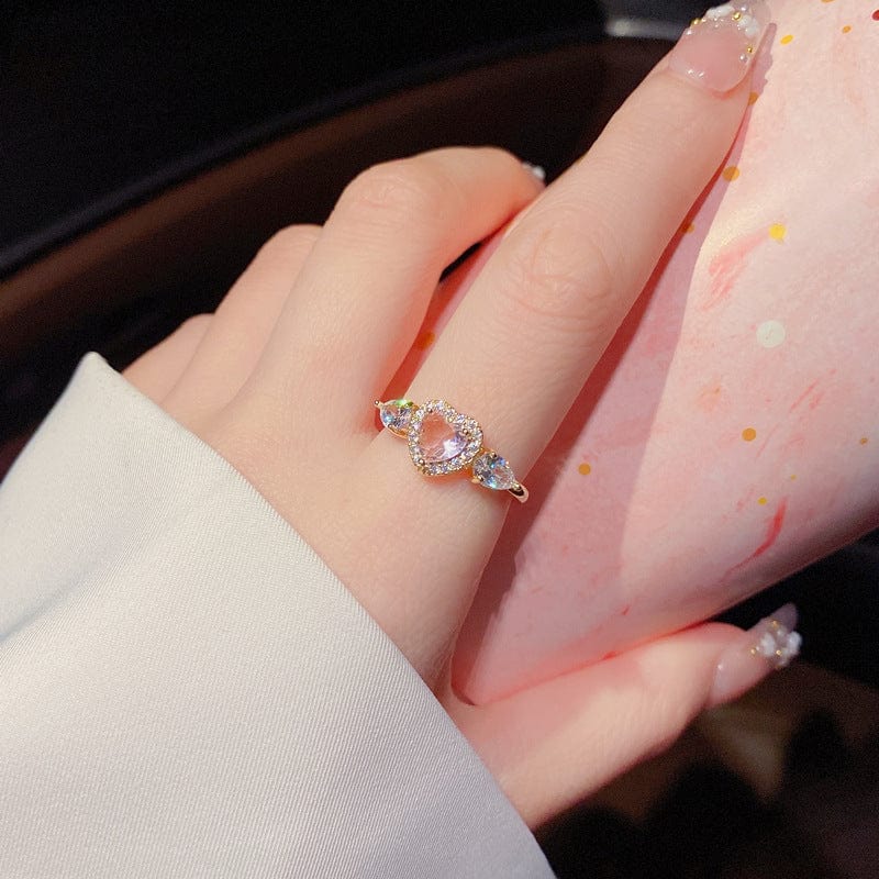 Bague en forme de cœur avec ailes d'ange en cristal rose ajustable