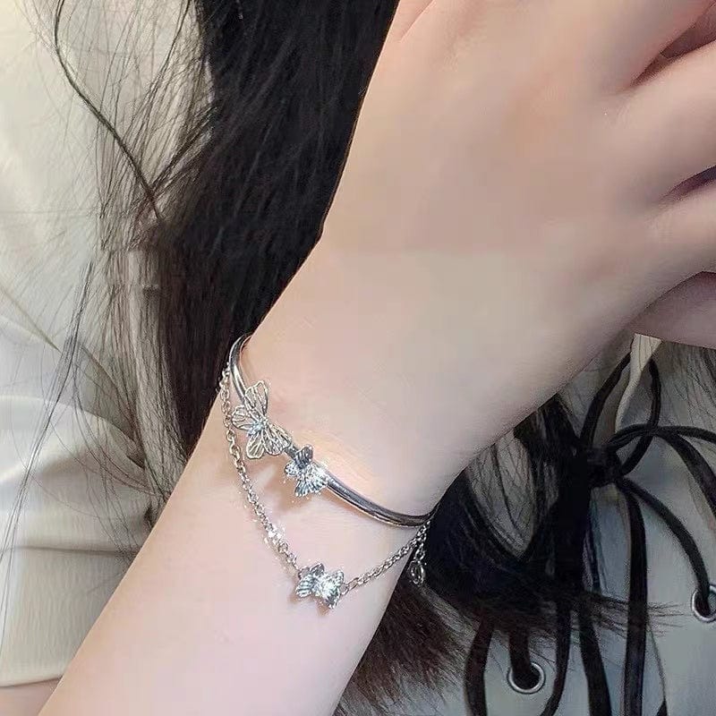 Bracelet jonc à chaîne torsadée avec breloque papillon