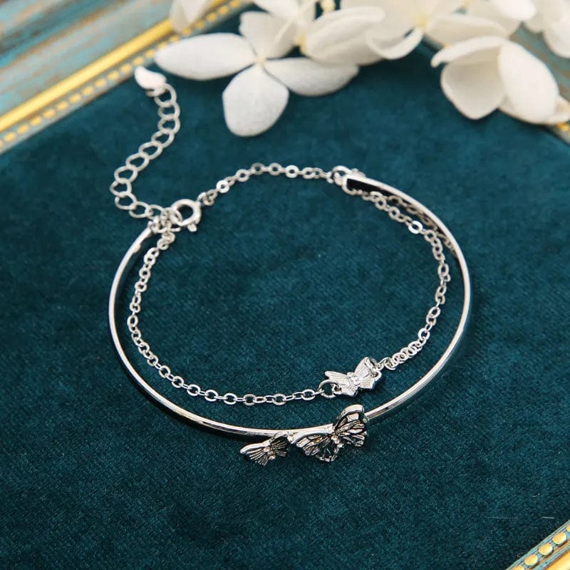 Bracelet jonc à chaîne torsadée avec breloque papillon