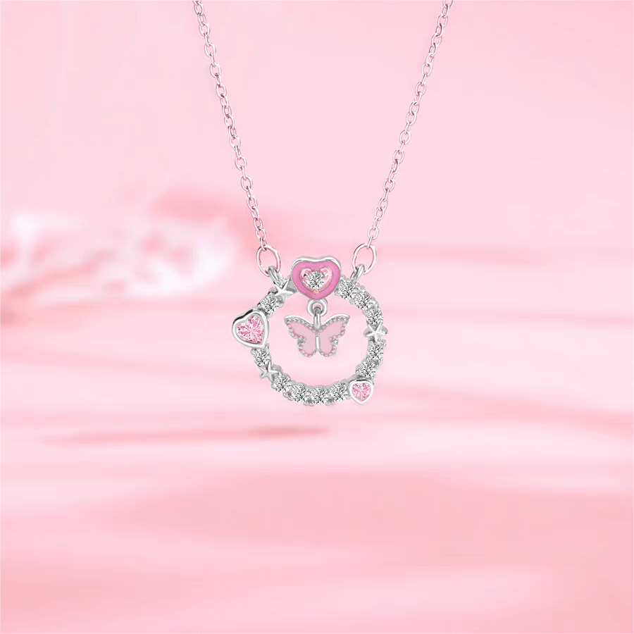 Collier avec anneau en forme de cœur et papillon rose