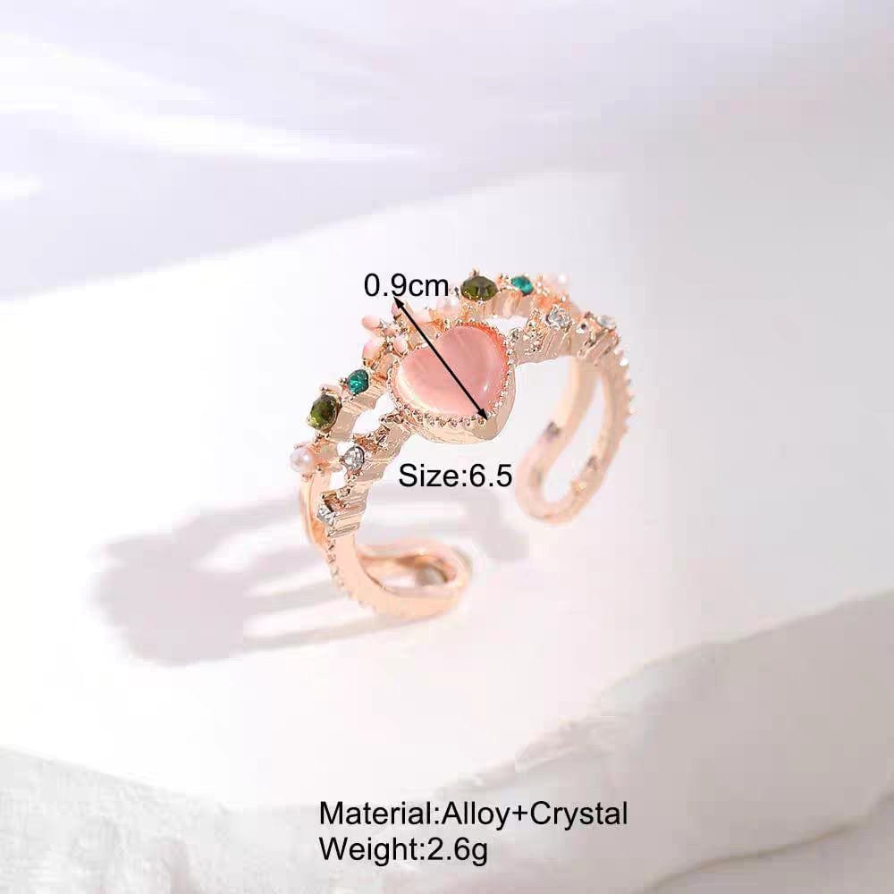 Bague coeur en opale avec un motif floral charmant et doux