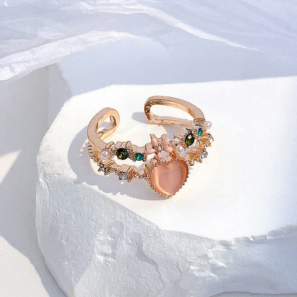 Bague coeur en opale avec un motif floral charmant et doux