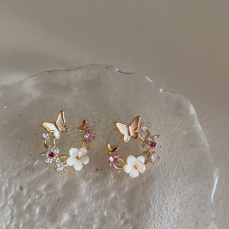 Boucles d'oreilles charmantes en forme de papillon et de coquillage