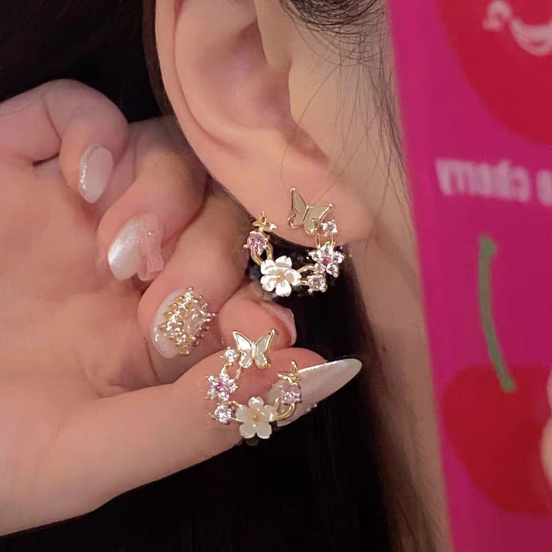 Boucles d'oreilles charmantes en forme de papillon et de coquillage