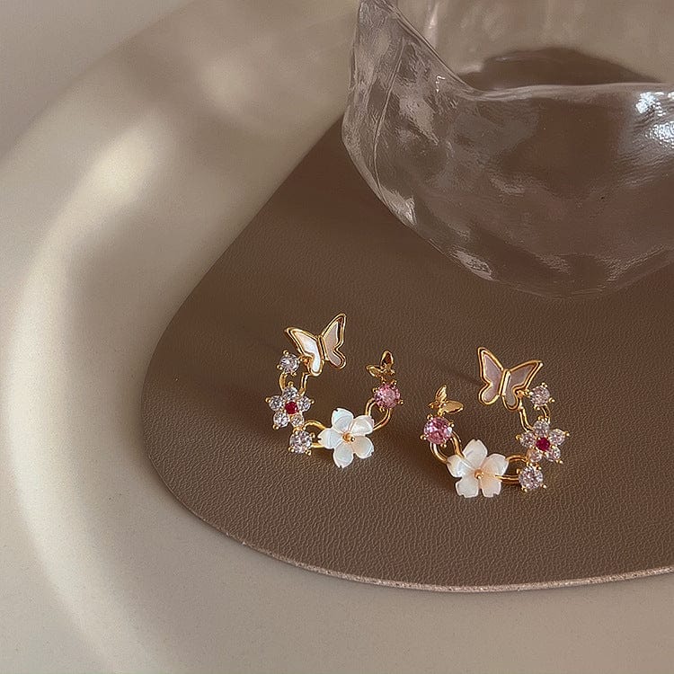 Boucles d'oreilles charmantes en forme de papillon et de coquillage