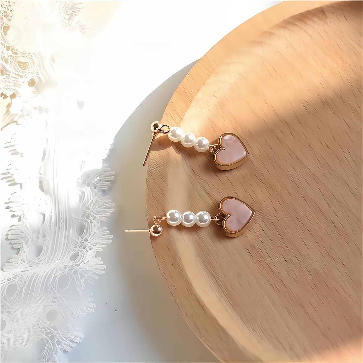 Boucles d'oreilles pendantes en forme de cœur en perles douces et chics