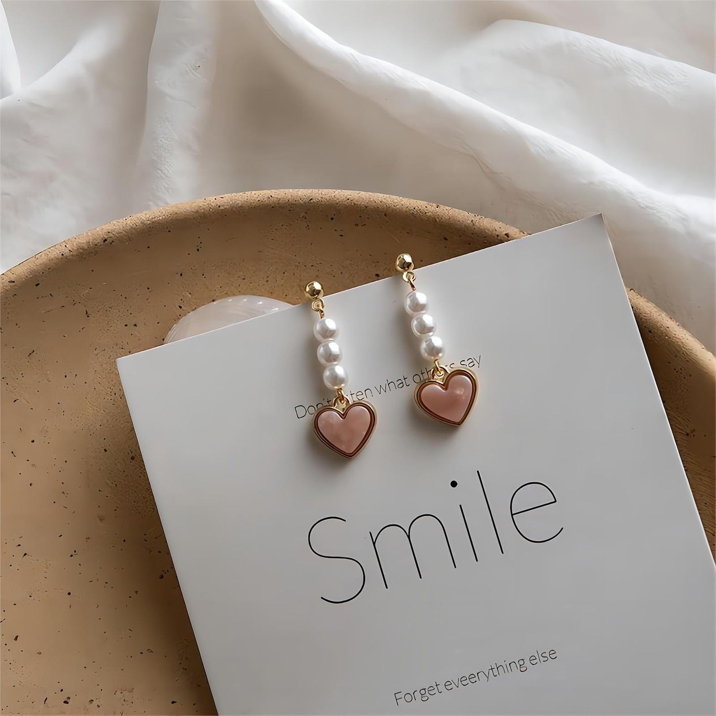 Boucles d'oreilles pendantes en forme de cœur en perles douces et chics