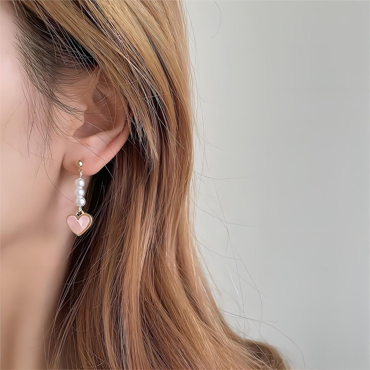 Boucles d'oreilles pendantes en forme de cœur en perles douces et chics