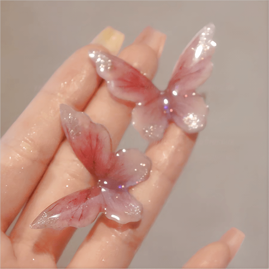 Boucles d'oreilles pendantes en forme de papillon rose