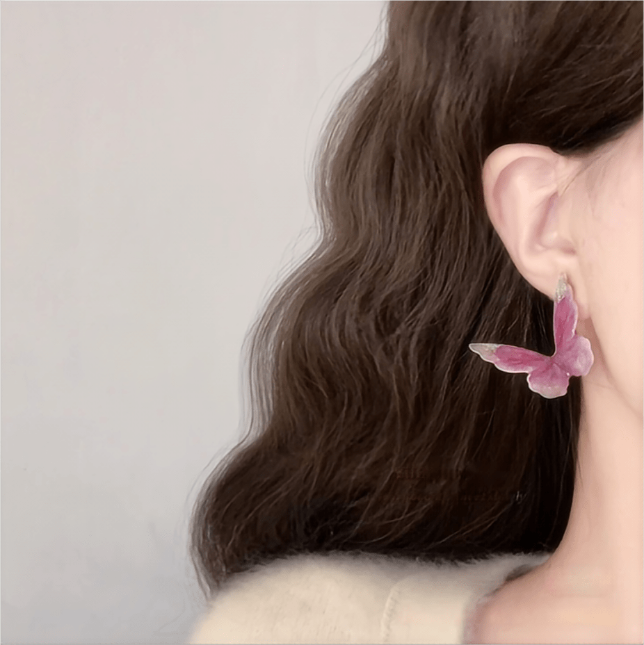 Boucles d'oreilles pendantes en forme de papillon rose