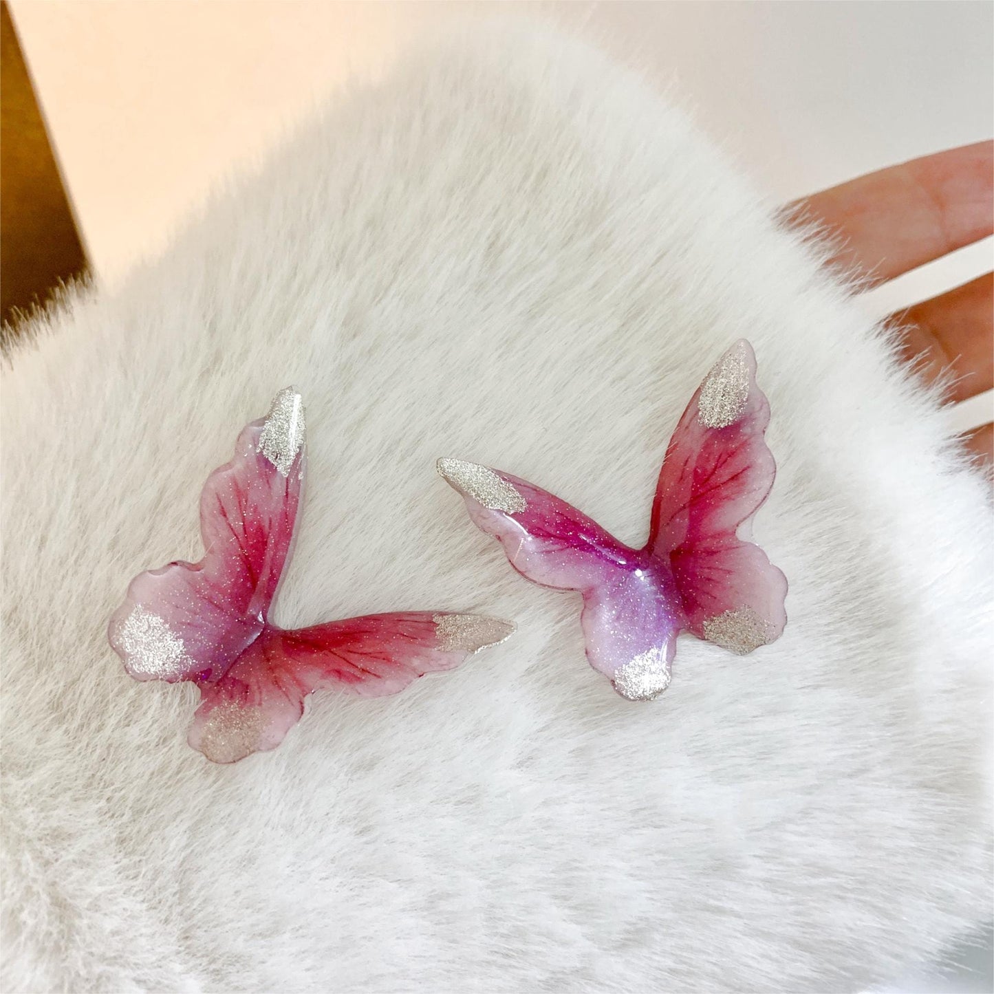 Boucles d'oreilles pendantes en forme de papillon rose