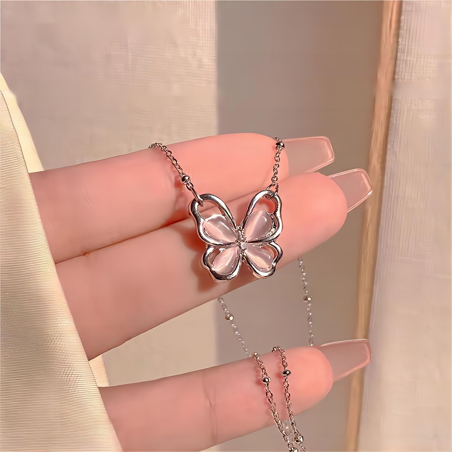 Exquisite Pink Cats Eye Stone Butterfly Necklace