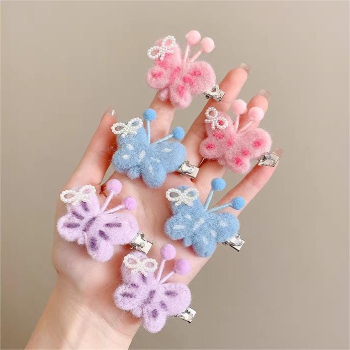 Pince à cheveux en forme de papillon en peluche