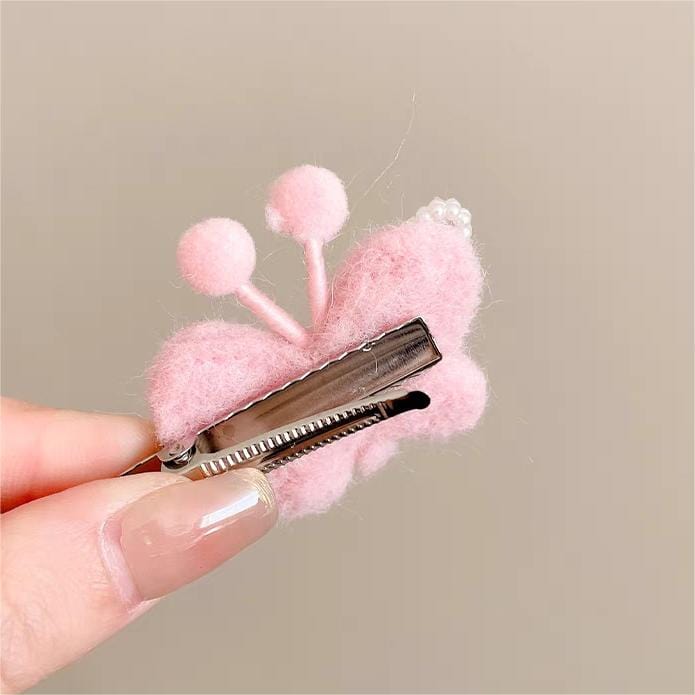 Pince à cheveux en forme de papillon en peluche