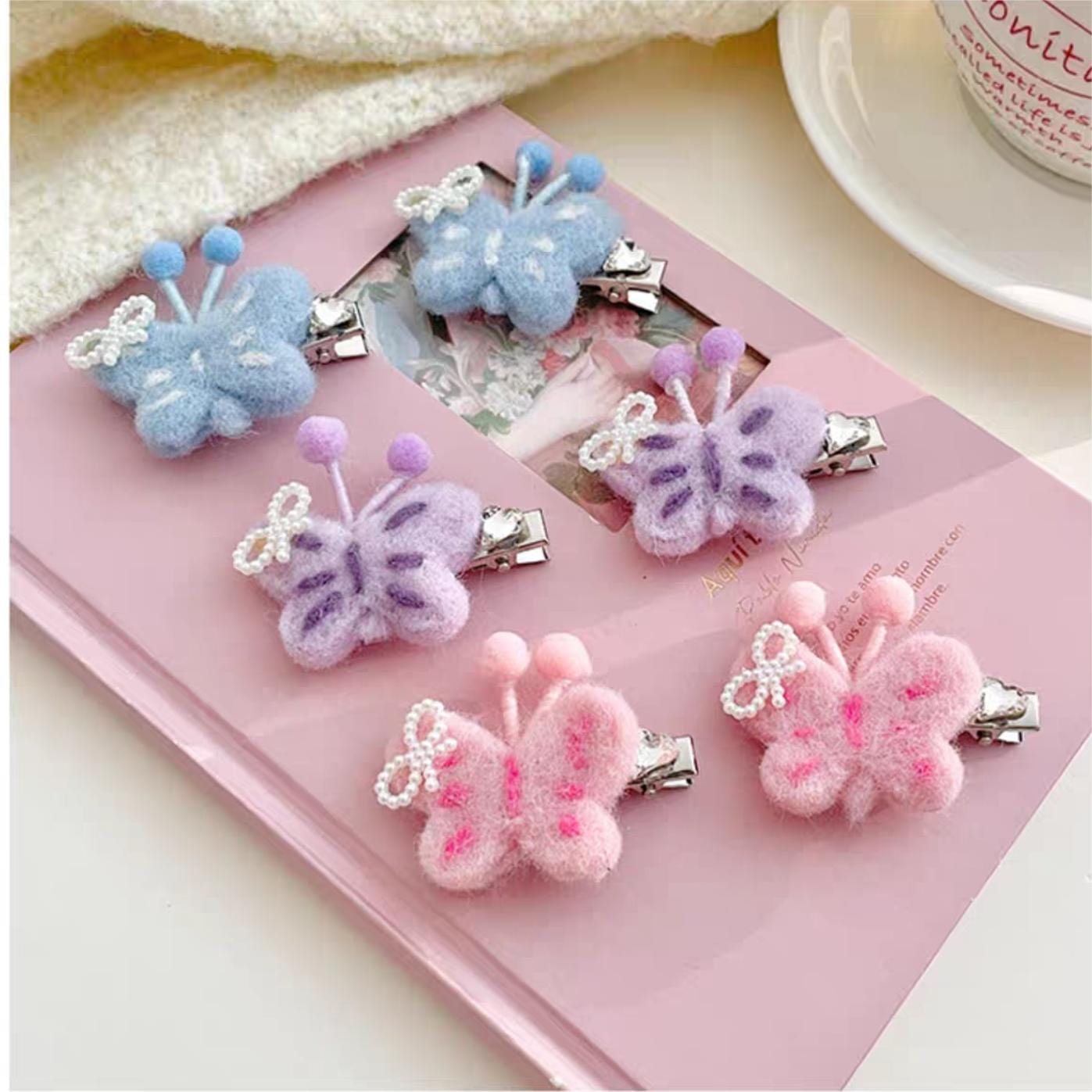 Pince à cheveux en forme de papillon en peluche