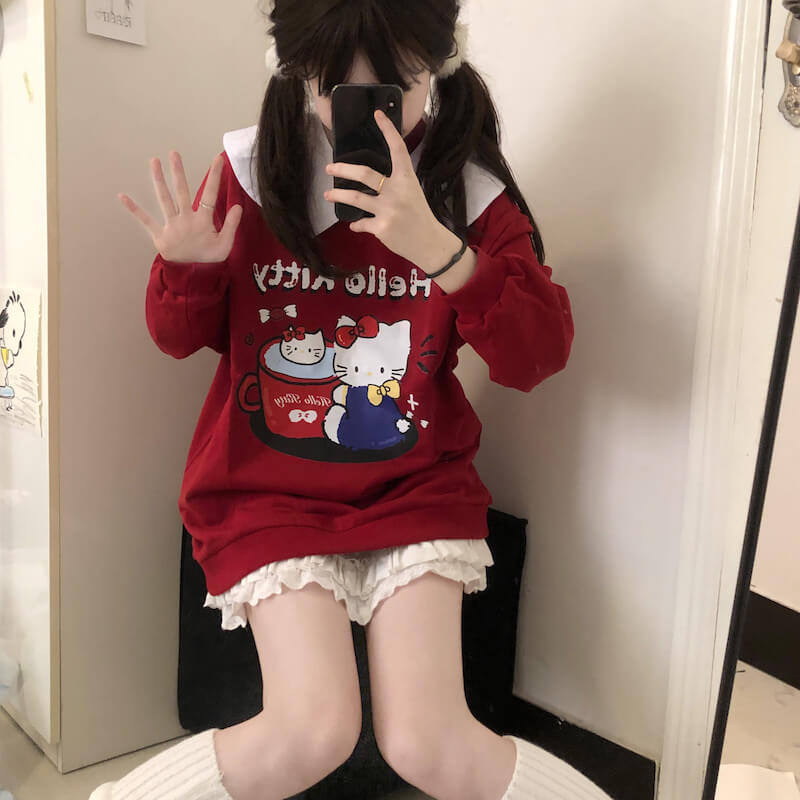 Sweat-shirt à col blanc avec chat rouge