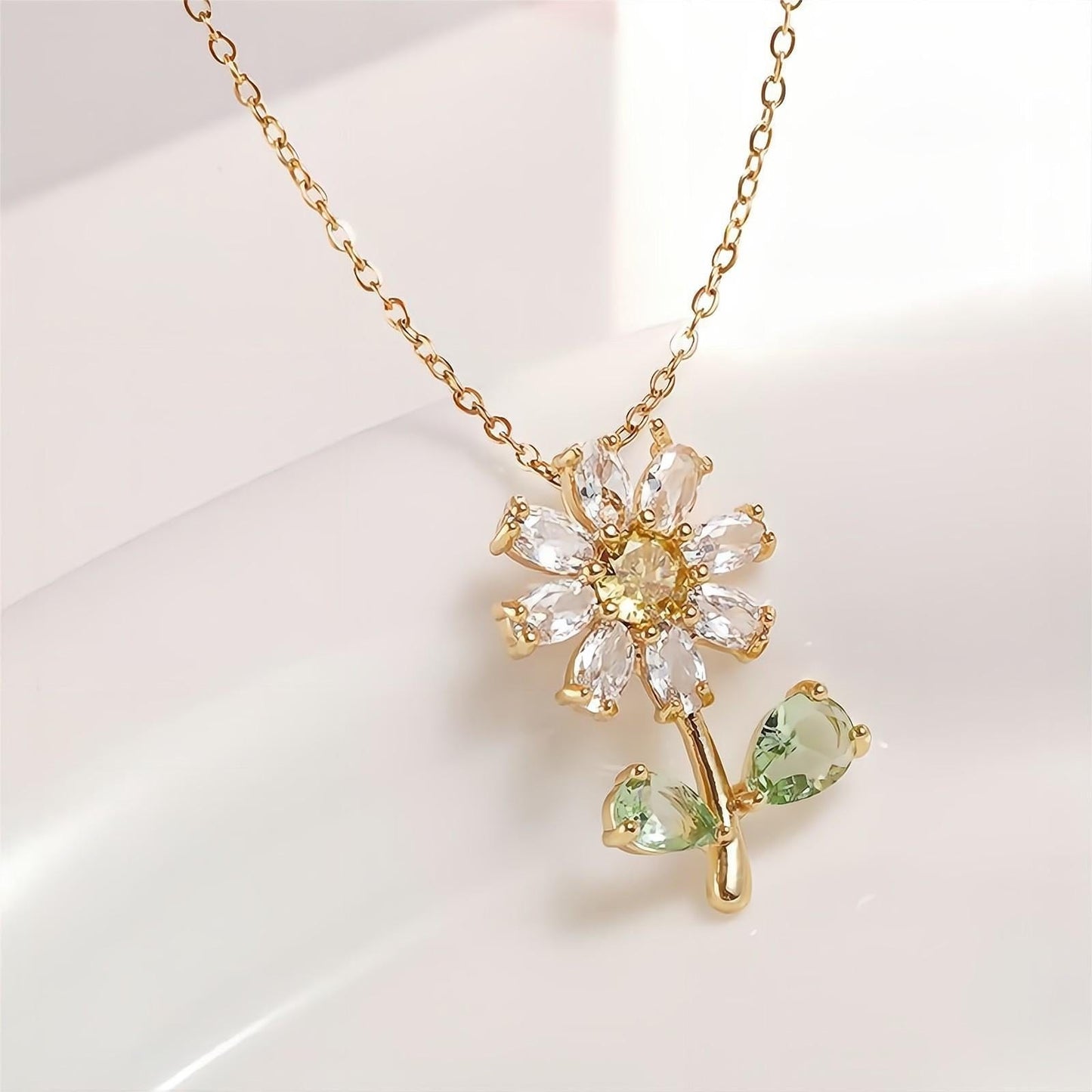 Ensemble de boucles d'oreilles et collier à fleurs de marguerite