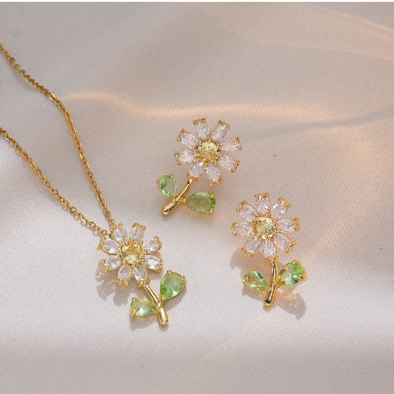 Ensemble de boucles d'oreilles et collier à fleurs de marguerite