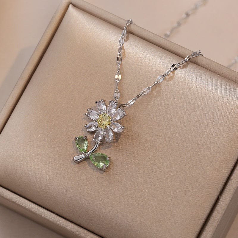 Ensemble de boucles d'oreilles et collier à fleurs de marguerite