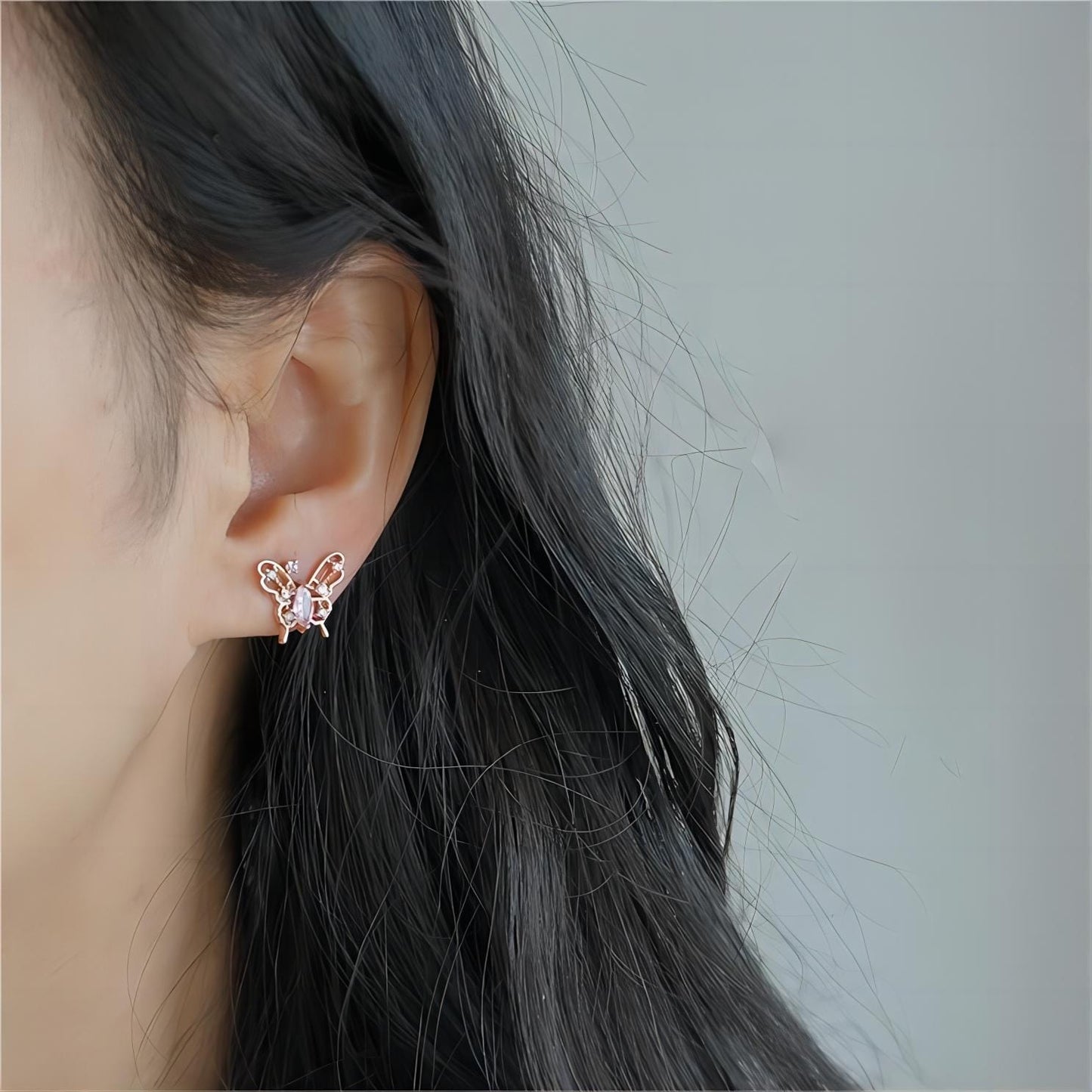 Boucles d'oreilles charmantes en forme de papillon creux
