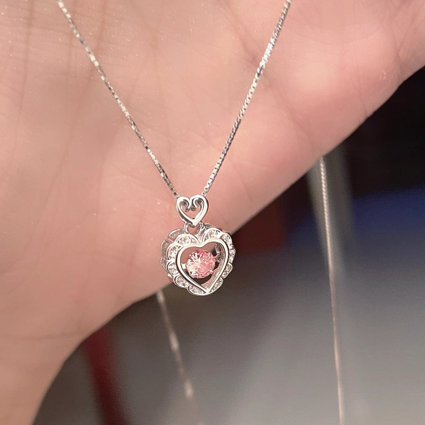 Elegant Pink Crystal Rolling Heart Pendant Necklace