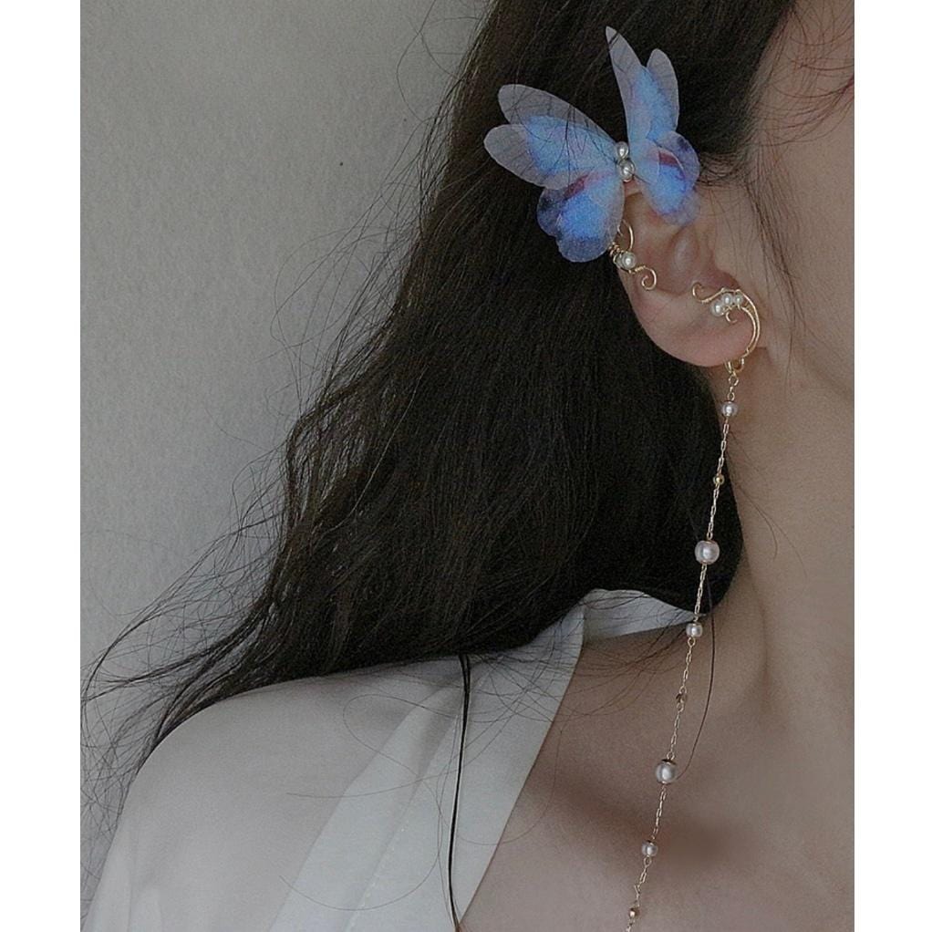 Eleganter mehrlagiger Ohrring mit Schmetterlingsperlen