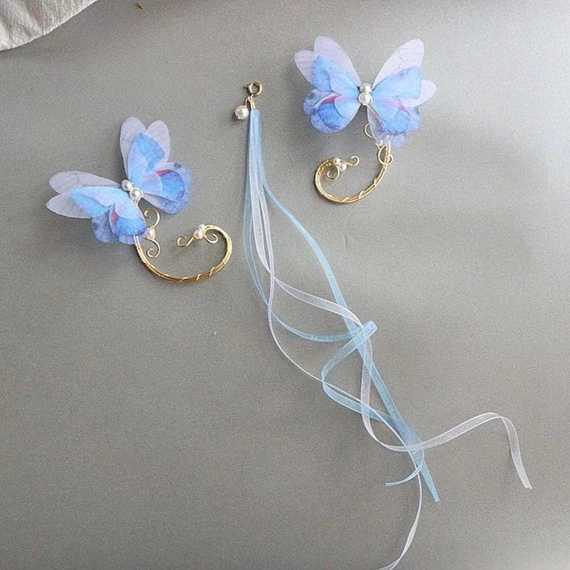 Eleganter mehrlagiger Ohrring mit Schmetterlingsperlen