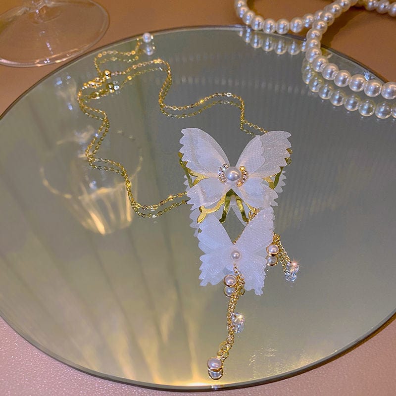 Collier élégant en chaîne avec papillon en maille