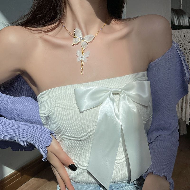 Collier élégant en chaîne avec papillon en maille