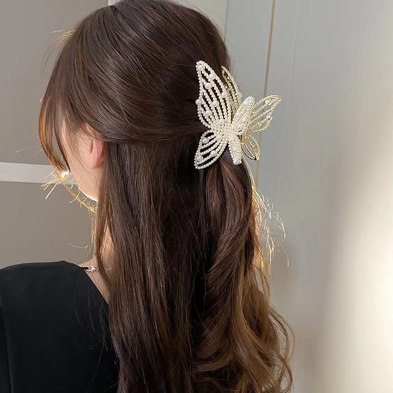 Pince à cheveux élégante en forme de papillon avec perles et strass