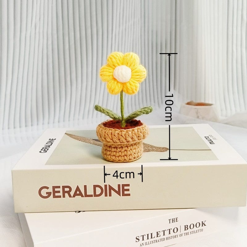 Handgestrickte Häkelblume im Topf