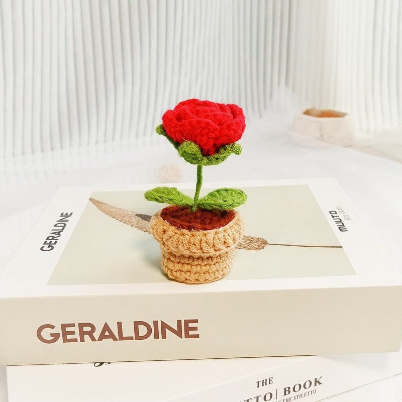 Handgestrickte Häkelblume im Topf