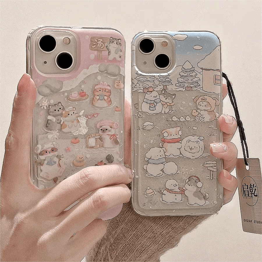 Coque iPhone autocollante Kawaii avec chiot et chaton flottant dans les neiges