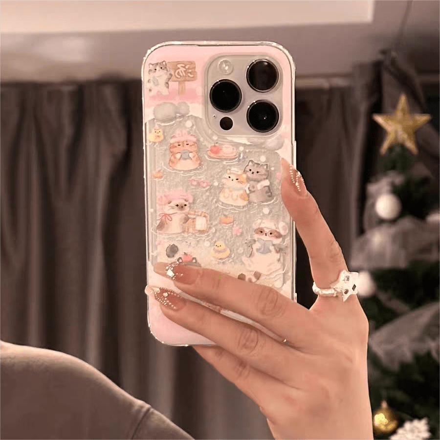 Coque iPhone autocollante Kawaii avec chiot et chaton flottant dans les neiges