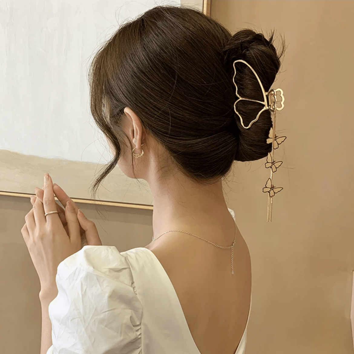Pince à chignon à pompon en chaîne papillon
