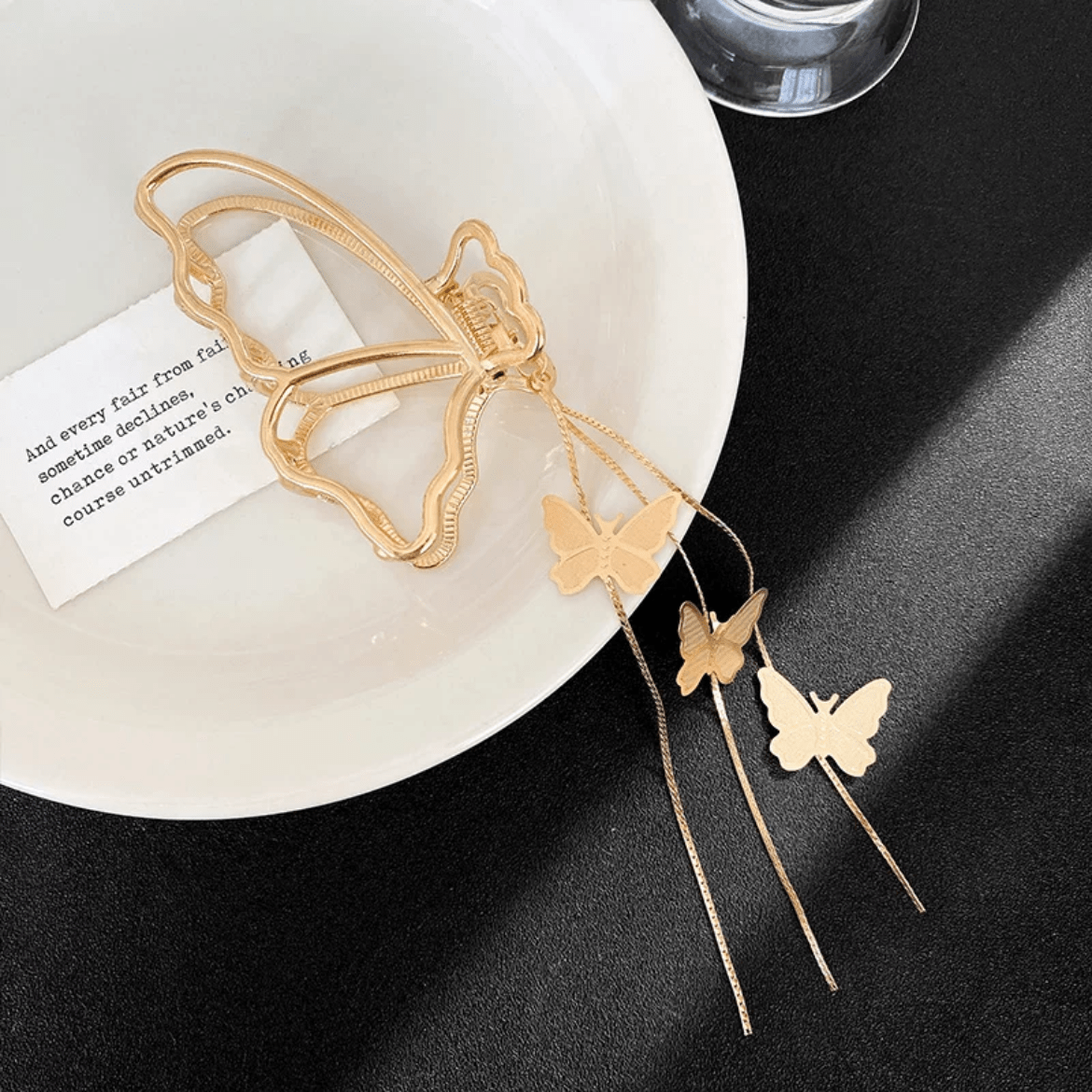 Pince à chignon à pompon en chaîne papillon