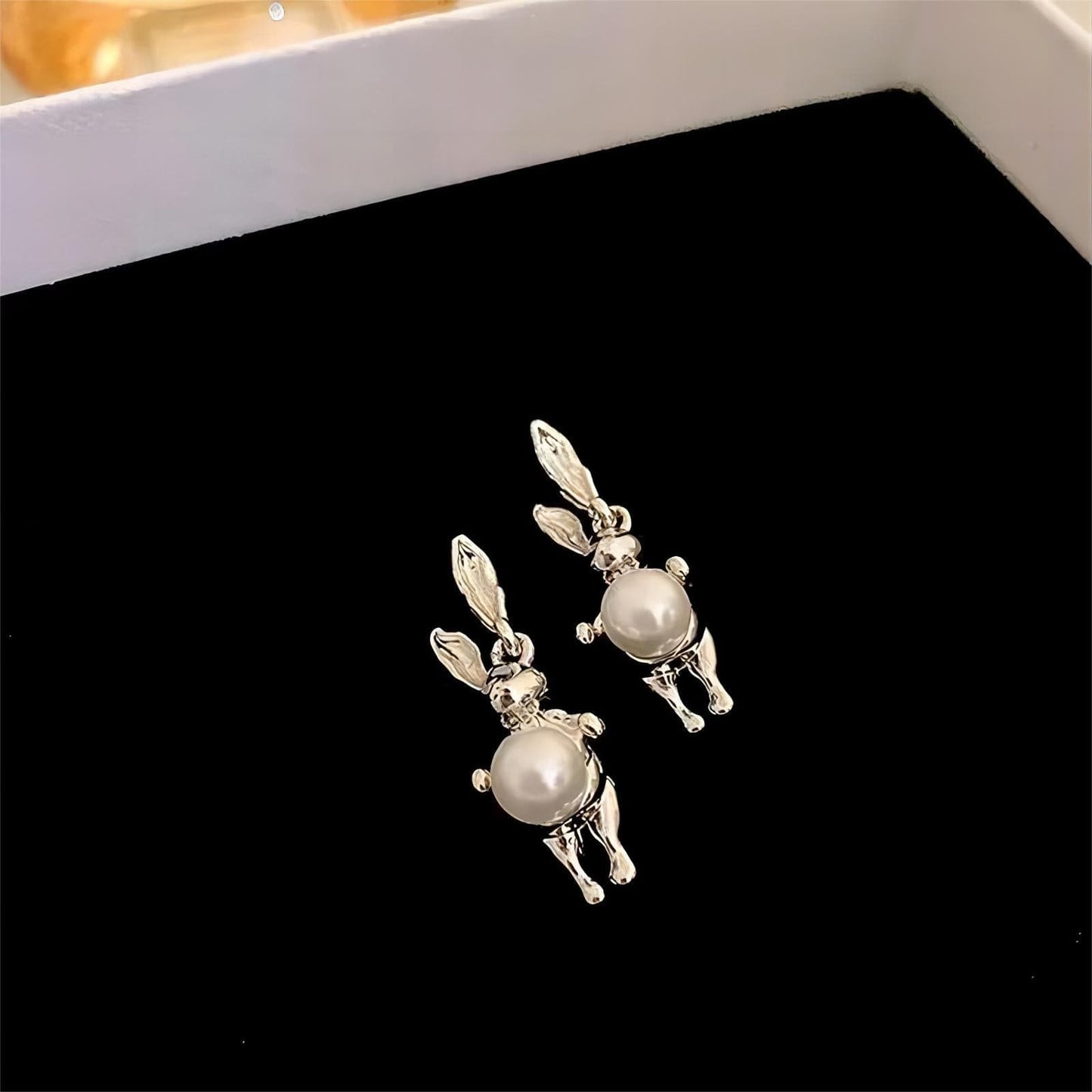 Boucles d'oreilles en argent et perles de lapin