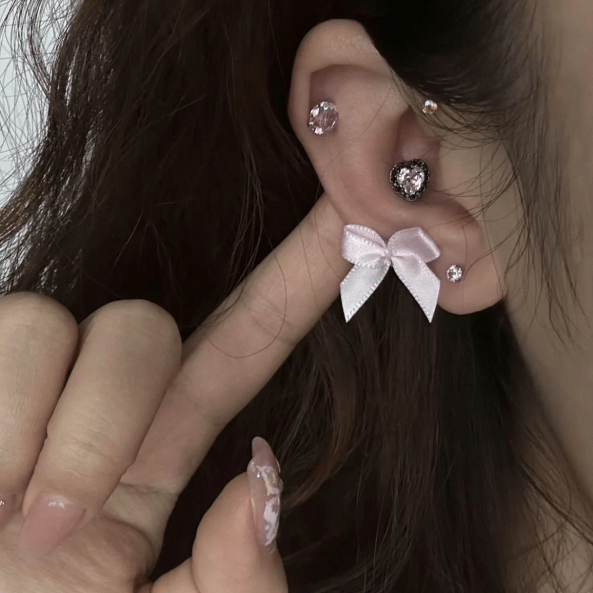 Boucles d'oreilles en forme de nœud papillon avec ruban rose