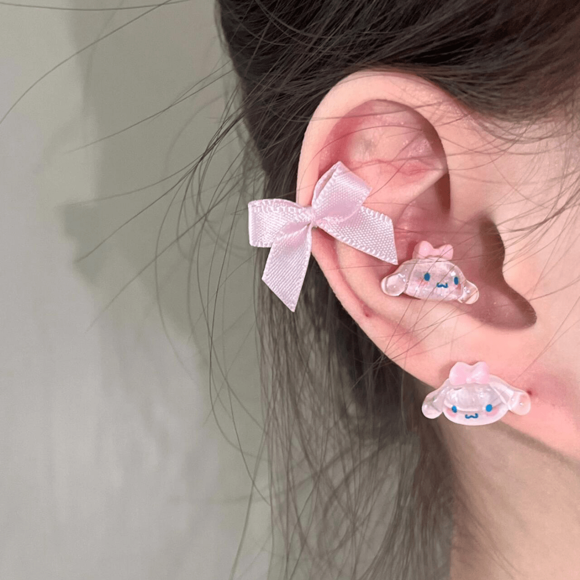 Boucles d'oreilles en forme de nœud papillon avec ruban rose