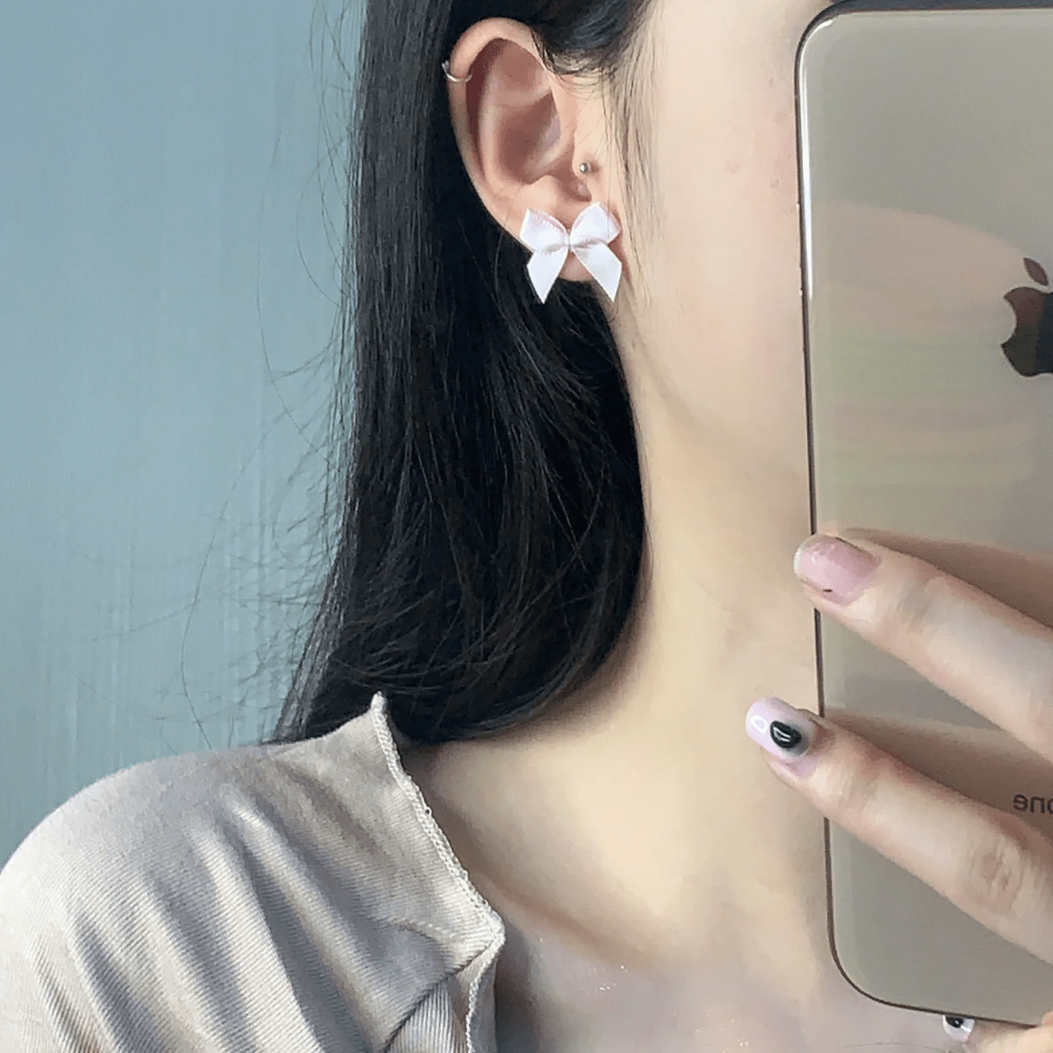 Boucles d'oreilles en forme de nœud papillon avec ruban rose